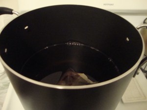 Har tea steeping in a gallon of water