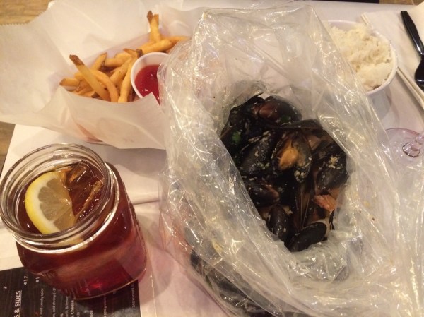 Shaking Crab mussels, fries, and sweet tea