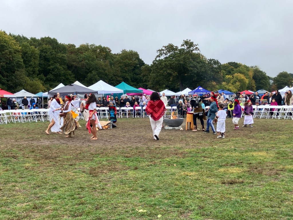 Native Americans dancing in a circle