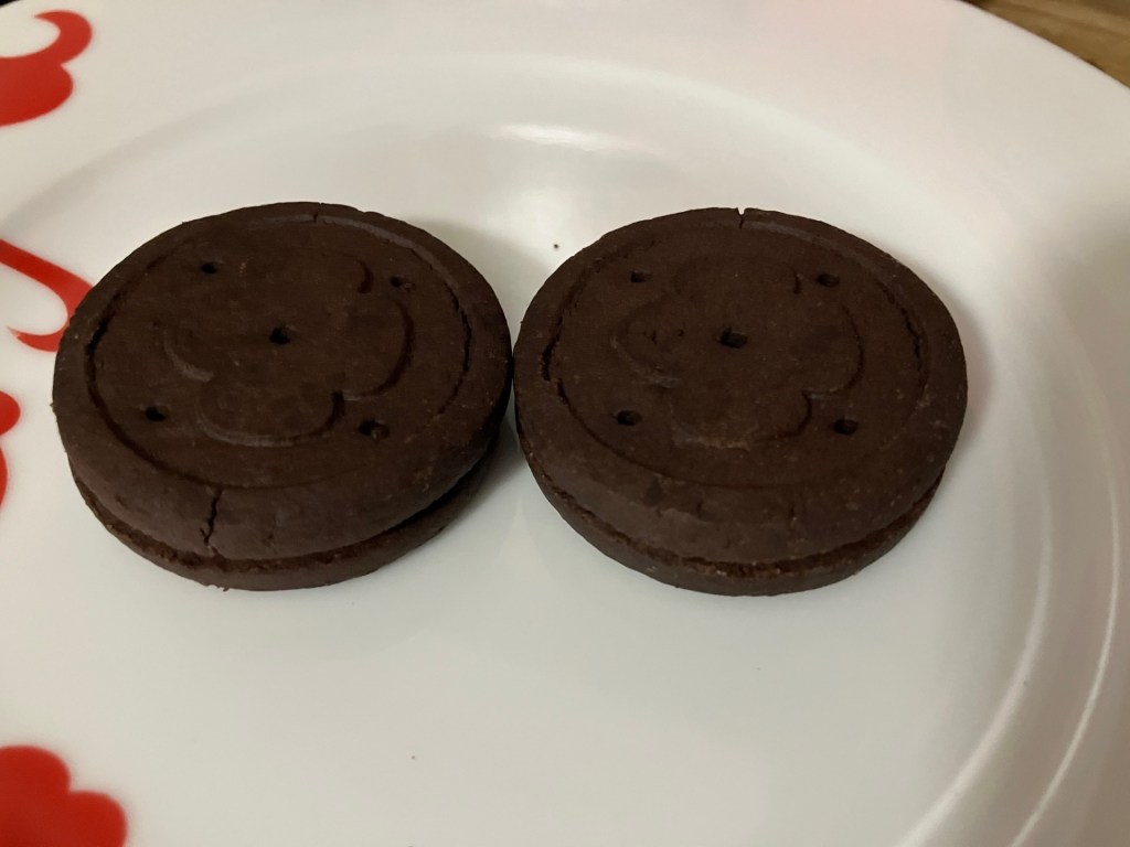 girl scout exploremore cookies on a plate